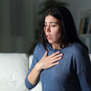woman gasping for breath