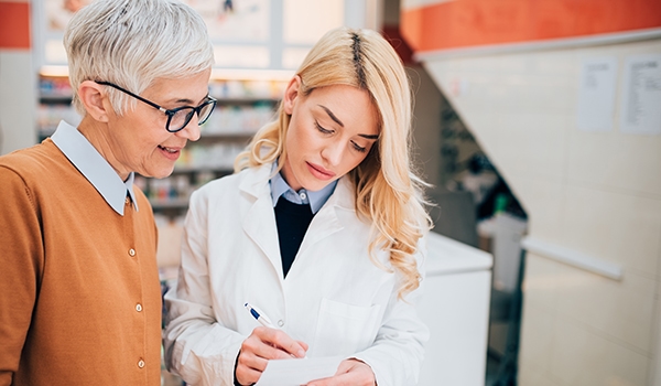 pharmacist assisting a patient